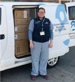  ?? LISA KASHINSKY / BOSTON HERALD ?? HELPING HAND: Dr. Virginia Sinnott-Stutzman of the MSPCA’s Angell Animal Medical Center stands with a vanload of supplies heading for hospitals battling the coronaviru­s pandemic.