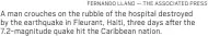 ?? FERNANDO LLANO — THE ASSOCIATED PRESS ?? A man crouches on the rubble of the hospital destroyed by the earthquake in Fleurant, Haiti, three days after the 7.2-magnitude quake hit the Caribbean nation.
