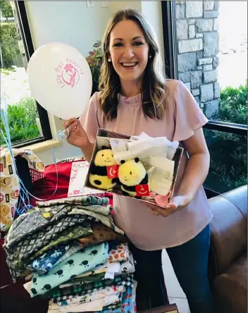  ?? Courtesy photo ?? Chelsea Rowley provides bereavemen­t kits through The Lilly Pad Project to Utah fami- lies with stillborn or miscarried babies.