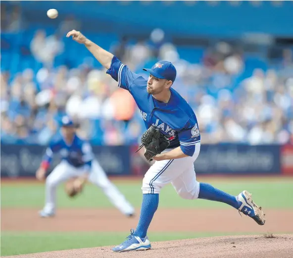  ?? — THE CANADIAN PRESS ?? Toronto Blue Jays starter Marco Estrada shows good form early but he faltered against the Tampa Bay Rays Wednesday at Rogers Centre. The wild-card contending Jays lost 8-1, dragging their record down to 3-9 for the month of September.