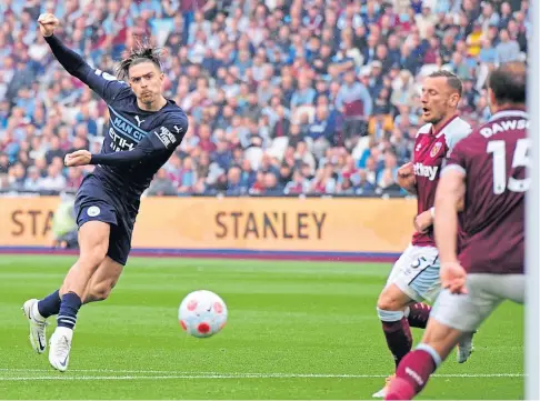  ?? ?? FIGHTBACK: Jack Grealish, centre, pulled a goal back for Manchester City before Vladimir Coufal’s own goal.