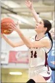  ?? MIKE CABREY — MEDIANEWS GROUP ?? Garnet Valley’s Haylie Adamski goes up for a basket against North Penn in the District 1 Class 6A quarterfin­als.