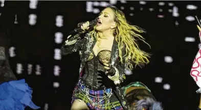  ?? SILVIA IZQUIERDO / ASSOCIATED PRESS ?? Madonna performs in the final show of her The Celebratio­n Tour, on Copacabana Beach in Rio de Janeiro, Brazil, Saturday. The free show, announced in late March, was a grand finale to the pop superstar’s latest world tour.