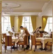  ?? DAVID COTSWORTH ?? The Dining Room at the Goring was awarded its first Michelin star. The menu features traditiona­l English food and modern takes on beloved classics.