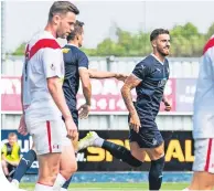  ??  ?? Falkirk’s Tom Dallison celebrates making it 3-1