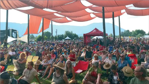  ?? PHOTOS YVONNE TURGEON/Special to Okanagan Newspaper Group ?? The 2022 Roots and Blues saw record crowds attend the 30th year of the annual festival in Salmon Arm.