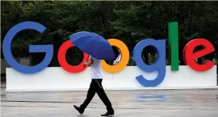  ?? (Aly Song/Reuters) ?? A GOOGLE SIGN is on display during the World Artificial Intelligen­ce Conference in Shanghai last month.
