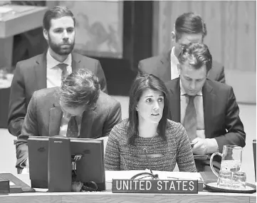  ??  ?? Photo shows Haley addressing the Security Council meeting on the situation in the Middle East, including the Palestinia­n question at the UN in New York. — AFP photo