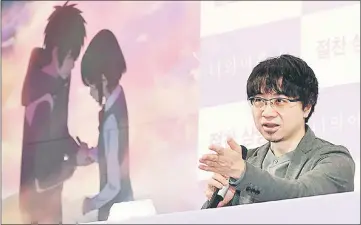  ??  ?? Makoto Shinkai,director of the Japanese animated movie ‘Your Name’, talks during a press conference at Imperial Palace Hotel in Seoul, Friday.