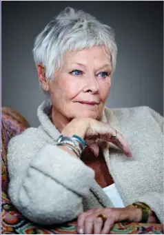  ??  ?? FIT AND FUN: Dame Judi at 85 is Vogue’s oldest cover star