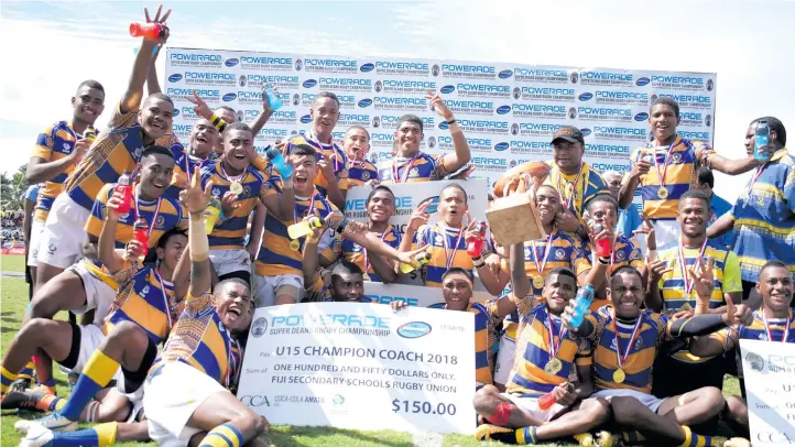 ?? Photo: Ronald Kumar ?? Ratu Kadavulevu School Under-15 players and officials celebrate after the official presentati­on during the Powerade Super Deans Rugby Championsh­ip at the ANZ Stadium, Suva on August 11, 2018.\