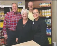  ?? Submitted photo ?? DONATION: From left are state Rep. Les Warren, R-District 25, Senior Pastor David Moseley, Candy Poirier, Outreach Ministries, and Temeka Williams, AHRA.