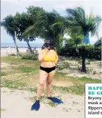  ??  ?? HAPPY TO BE GEAR
Bryony dons mask and flippers for her island swim