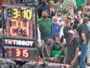  ?? EBONY COX / MILWAUKEE JOURNAL SENTINEL ?? Rapper Gucci Mane is among the fans at Game 6 at Fiserv Forum in Milwaukee.