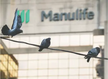  ?? COLE BURSTON / THE CANADIAN PRESS FILES ?? Manulife has invested $750 million since 2018 to boost its digital capabiliti­es.
The digital transforma­tion is among the firm’s top five strategic priorities.