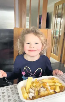  ??  ?? All smiles Éabha Morton enjoying a free kids’ lunch from The Plaice to be in Pitlochry last Friday