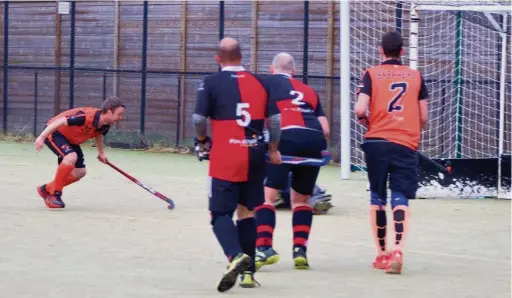  ??  ?? ●●Kieran King scores the first of his two goals in the derby clash against Bury