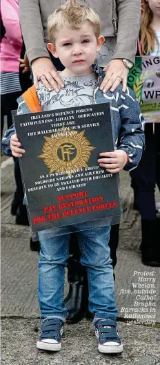  ??  ?? Protest: Harry Whelan, five, outside Cathal Brugha Barracks in Rathmines yesterday