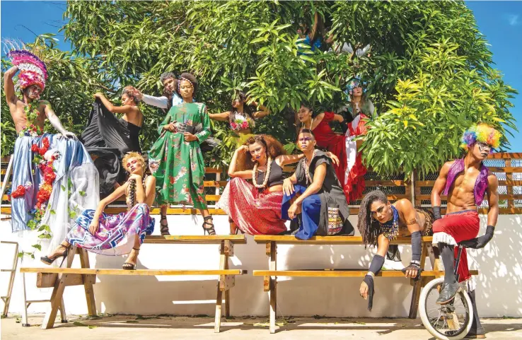  ?? Photo: Niyaaz Dean ?? Models Jorja Naidu (siiting), Serenia Raura, Hanisi Hodge (siiting), Kyle Kava (siiting) with the Vou Dance Group who are part of the official entertainm­ent for the Bottega Gold Fijian Fashion Festival. With a desire to bring attention to Suva as the...