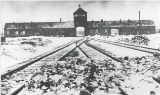  ??  ?? HORRIFIC: Werner Reich endured the stench of burning bodies from his bunk at the infamous Nazi concentrat­ion camp in Oswiecim, Poland.