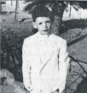  ??  ?? Twannie Aquilina on his First Holy Communion