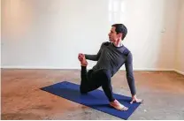  ?? Steve Gonzales / Houston Chronicle ?? Henry Richardson, founder of DEFINE body & mind, demonstrat­es a Quadriceps Stretch.