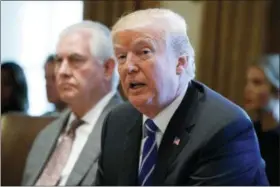  ?? THE ASSOCIATED PRESS ?? Secretary of State Rex Tillerson listens as President Donald Trump announces that the United States will designate North Korea a state sponsor of terrorism during a cabinet meeting at the White House, Monday, Nov. 20, 2017, in Washington.