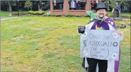  ??  ?? One marcher shows that asexuals have their place among the LGBTQ+ community