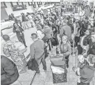  ??  ?? Ticket counters at the Atlanta airport on Monday. JOHN SPINK, AP