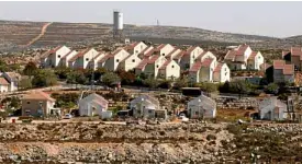  ?? —REUTERS ?? MORE SETTLEMENT­S General view of houses in Shvut Rachel, a Jewish settlement in the West Bank near Ramallah.