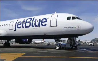  ?? SETH WENIG — THE ASSOCIATED PRESS ?? JetBlue Airways will end service at several cities and reduce flying out of Los Angeles in a move to retrench and focus on stronger markets after years of losing money.
