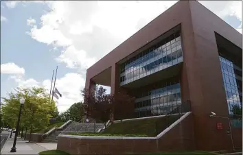  ?? H John Voorhees III / Hearst Connecticu­t Media ?? The state Superior Court building in Danbury. Catherine Koeppel, a 36-year-old state police sergeant charged with leaving the scene of a motor vehicle crash last month, was due to appear for arraignmen­t Friday but the case has been delayed.