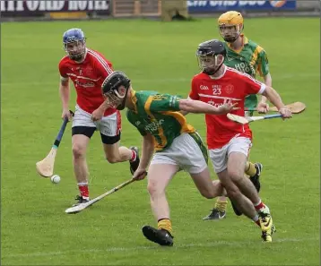  ??  ?? Rathgarogu­e-Cushinstow­n’s Peadar Cody comes up against Matthew Dunne of Monageer-Boolavogue.