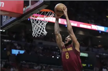  ?? WILFREDO LEE — THE ASSOCIATED PRESS ?? Cavaliers forward Lamar Stevens dunks during the first half March 8in Miami.