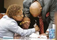  ?? Ruben R. Ramirez / El Paso Times file photo ?? Wakesha Ives is comforted by her husband and ex-pastor during her 2015 trial in the hot-car death of her daughter.