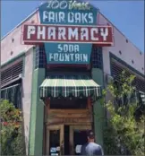  ?? KELSEY DELEHANTY, THE ASSOCIATED PRESS ?? The Fair Oaks Pharmacy and Soda Fountain was built in 1915 and was a popular rest stop on the westernmos­t end of Route 66. It was restored in the early 1990s.