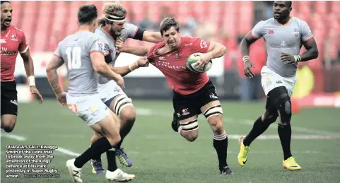  ?? PICTURE: BACKPAGEPI­X ?? QUAGGA’S CALL: Kwagga Smith of the Lions tries to break away from the attention of the Kings’ defence at Ellis Park yesterday in Super Rugby action.