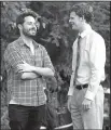  ??  ?? Garrard Conley (left) and actor Lucas Hedges talk on the set of Boy Erased. Conley, an Arkansas native, wrote the memoir on which the movie is based.