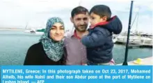  ??  ?? MYTILENE, Greece: In this photograph taken on Oct 23, 2017, Mohamed Alhelb, his wife Nahil and their son Abdur pose at the port of Mytilene on Lesbos Island. — AFP