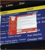  ?? Associated Press ?? A display panel with an error can be seen at the main railway station in Chemnitz, Germany. Germany’s national railway says that it was among the organizati­ons affected by the global cyberattac­k but there was no impact on train services.