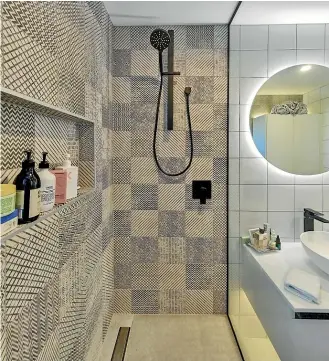  ??  ?? A compact bathroom designed by Shane George in an Auckland apartment.