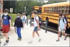  ?? Ned Gerard / Hearst Connecticu­t Media ?? Students arrive for the first day of classes at Coleytown Middle School in Westport Aug. 31.