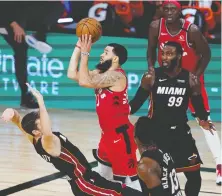  ?? ASHLEY LANDIS/THE ASSOCIATED PRESS ?? Fred Vanvleet and his defending champion Raptors are thriving in the Florida bubble, as is the NBA, which is reeling in strong television viewership numbers.