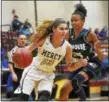  ?? CATHERINE AVALONE — REGISTER ?? Mercy’ Samantha Chapps drives to the hoop as Hillhouse’s Tanayja London defends on Saturday.