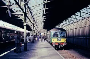  ?? FERNDALE MEDIA ?? Pressure is growing for the reinstatem­ent of train services to Peterhead and Fraserburg­h in northeast Scotland. On August 31, 1964, a Cravens DMU stands under the roof at Fraserburg­h with a train for St Combs. Services ceased the following year.