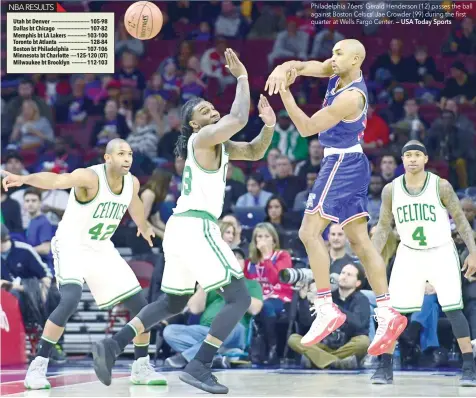  ?? — USA Today Sports ?? Philadelph­ia 76ers’ Gerald Henderson (12) passes the ball against Boston Celtics’ Jae Crowder (99) during the first quarter at Wells Fargo Center.