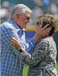  ?? NAM Y. HUH/AP ?? Harrelson hugs wife Aris on ‘‘Hawk Day’’ on Sept. 2, 2018, at Guaranteed Rate Field. He was honored by the Sox before a game against the Red Sox for his years of service to the franchise.