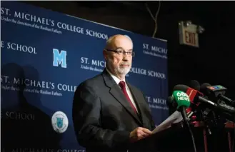  ?? The Canadian Press ?? St. Michael’s College School principal Gregory Reeves speaks to reporters Monday in Toronto.