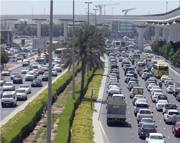  ?? — Photo by Dhes Handumon ?? Traffic backed up on Al Qiyadha Road in Al Nahda area in Dubai on May 28, after the start of Ramadan. Accidents are frequent during the morning rush hours this month.