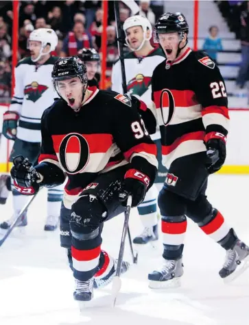  ?? JEAN LEVAC/OTTAWA CITIZEN ?? Mika Zibanejad, left, celebrates his first-period goal with Erik Condra during Wednesday’s game against the Minnesota Wild. His one-goal, one-assist night helps bolster the argument that he should be one of the team’s top six forwards. PAUL MACLEAN...